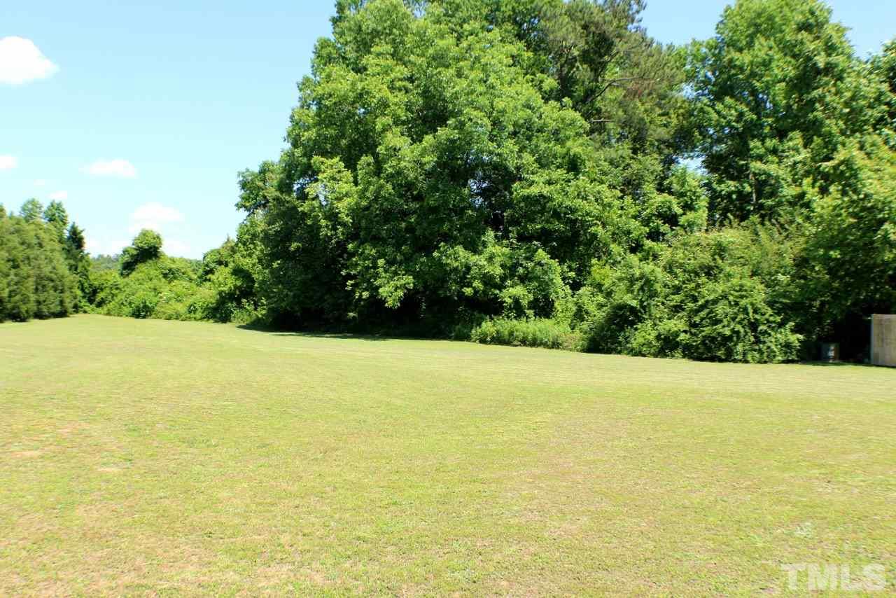820 Hood Farm Road Clayton, NC 27520 - Photo 2 of 20 Enjoy this large, open back yard with the beautiful trees & your very own storage shed or WORKSHOP!