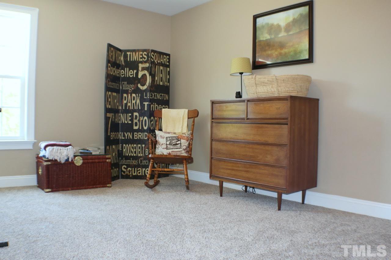 820 Hood Farm Road Clayton, NC 27520 - Photo 18 of 20 Great extra space with lots of possible uses, 2nd bonus room, office, playroom, or anything else you desire it to be!