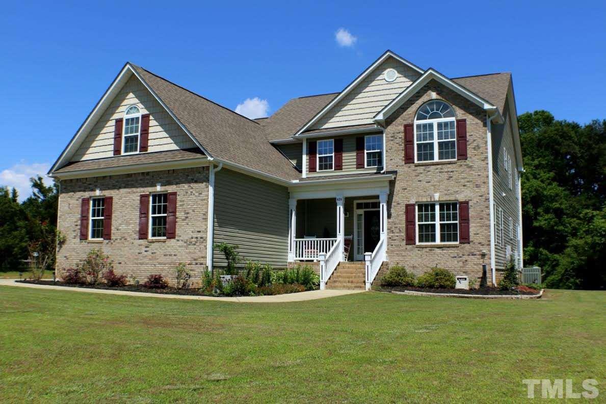 820 Hood Farm Road Clayton, NC 27520 - Photo 20 of 20 A long driveway leads you to this beautiful CUSTOM BUILT 4-5 Bedroom, 3 & 1/2 Bath home with a SIDE ENTRY 2 car GARAGE, covered front porch, SCREENED PORCH, & 2.2 ACRES of wonderful outdoor space!