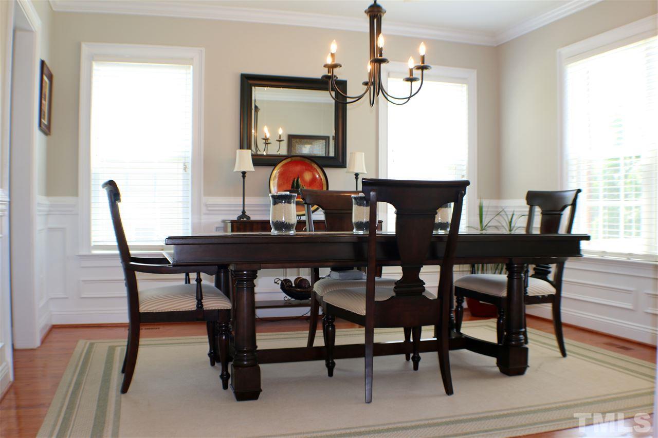 820 Hood Farm Road Clayton, NC 27520 - Photo 3 of 20 Enjoy entertaining friends & Family in this bright & open Dining Room with HARDWOOD FLOORS, fresh paint, TRAY CEILING, & easy access to the kitchen.