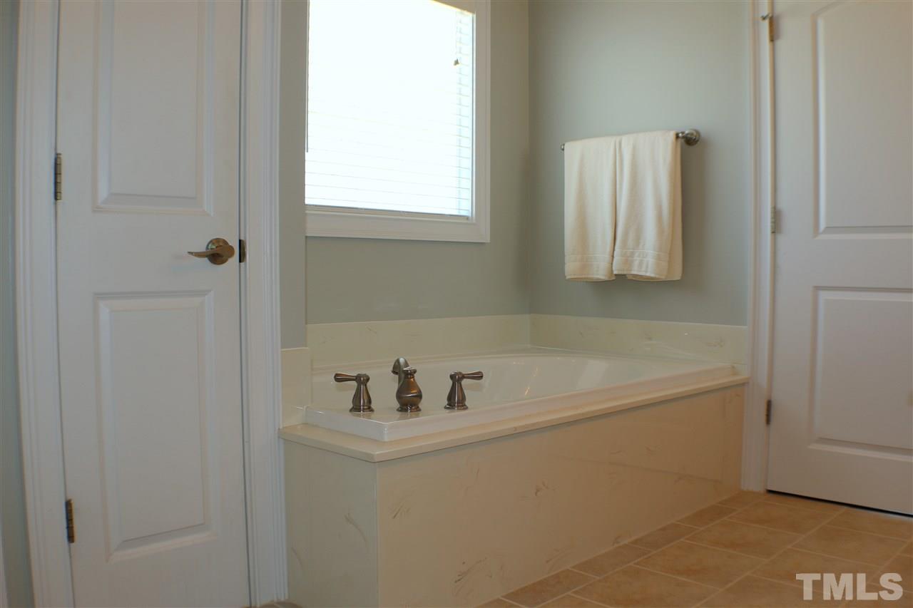 820 Hood Farm Road Clayton, NC 27520 - Photo 8 of 20 Unwind from your day in this GARDEN TUB.