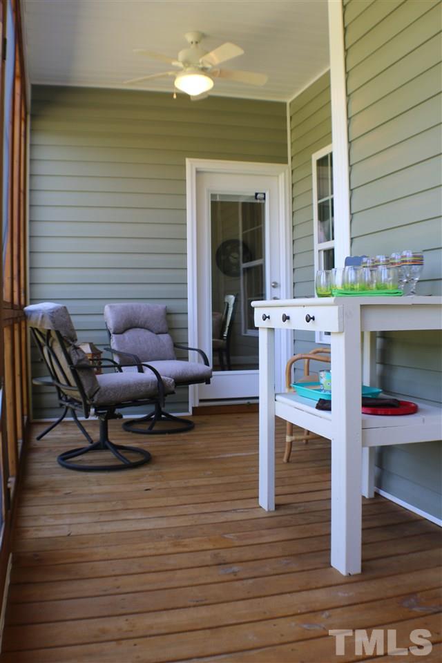 820 Hood Farm Road Clayton, NC 27520 - Photo 9 of 20 Enjoy sipping sweet tea & looking at your private oasis on this screened porch.