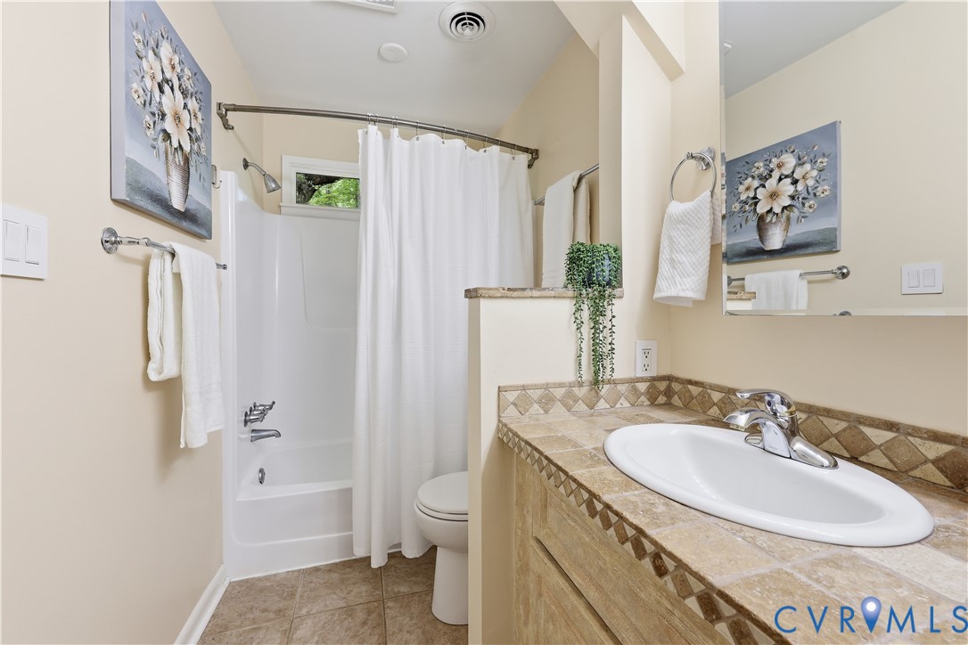 13622 Winterberry Ridge Midlothian, VA 23112 - Photo 21 of 47 a bathroom with a sink toilet and shower