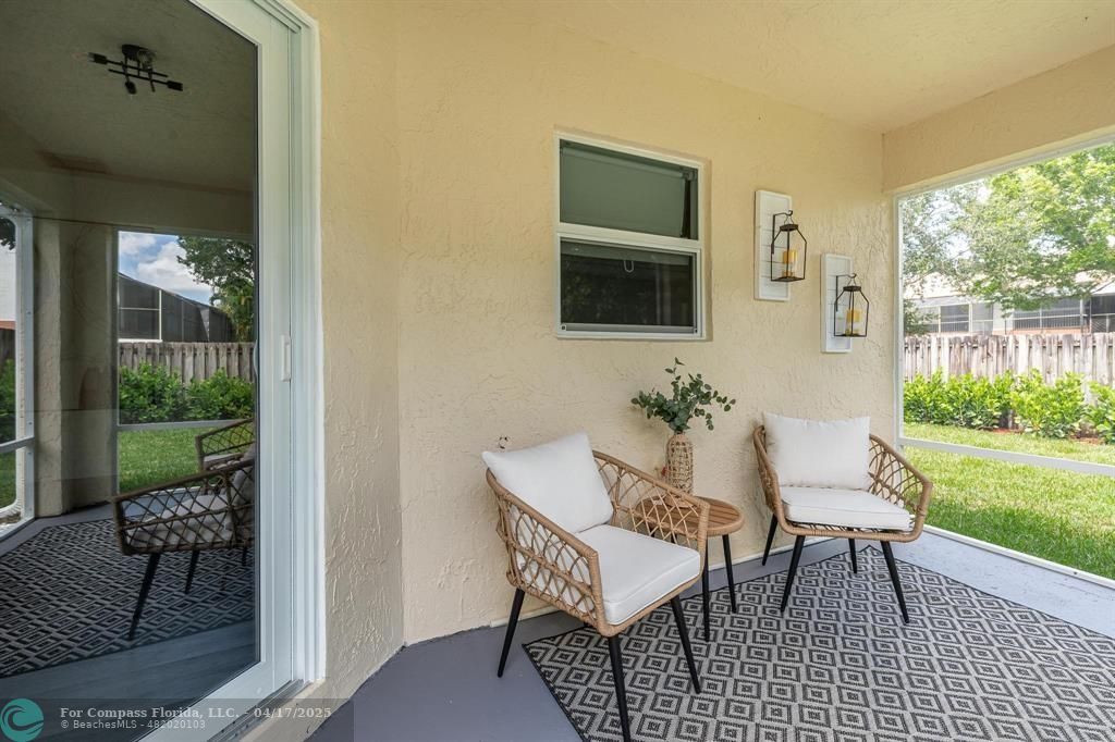 Undisclosed Address Davie, FL 33314 - Photo 22 of 23 a view of a porch with chairs and backyard