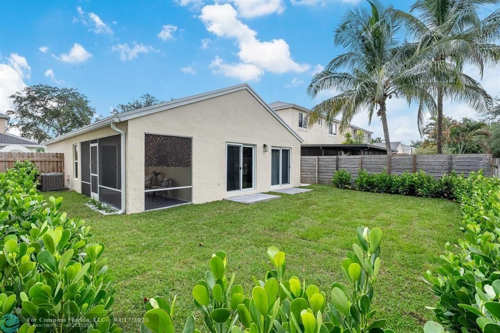 Undisclosed Address Davie, FL 33314 - Photo 23 of 23 a view of a house with backyard and garden