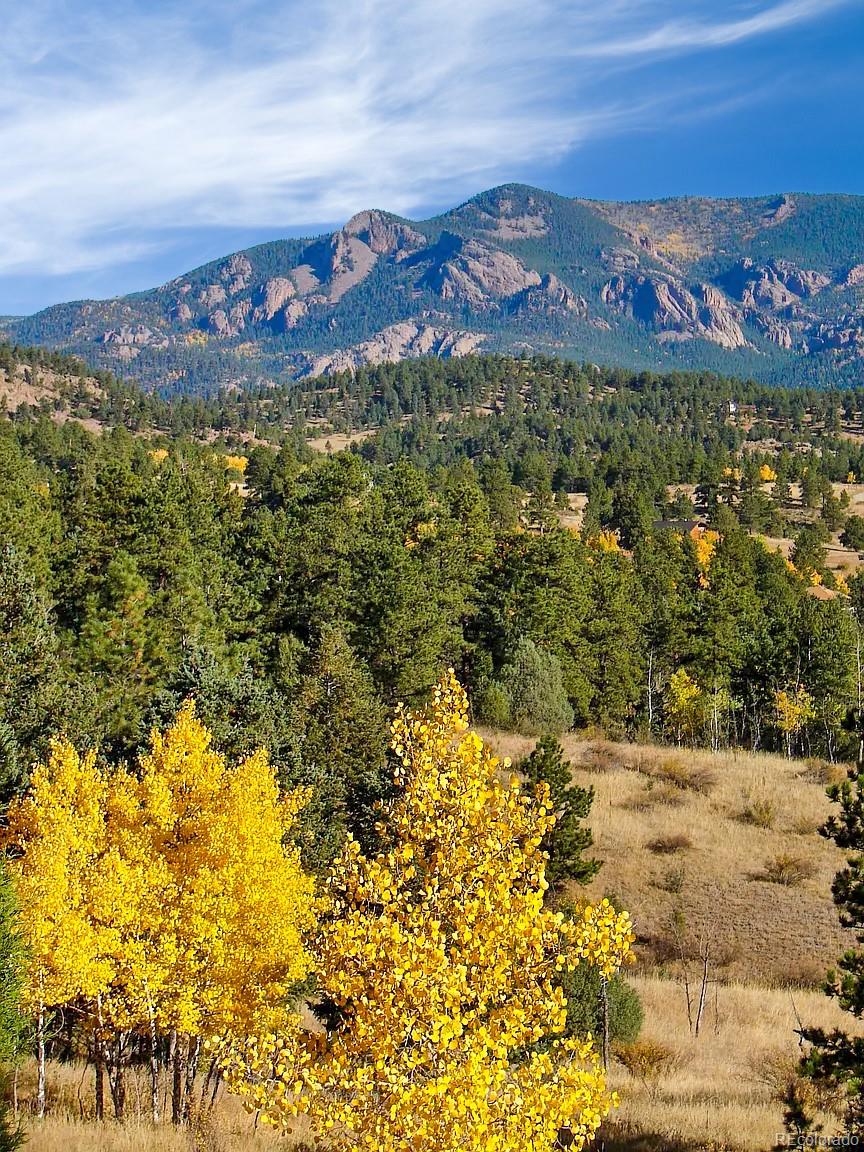 14482 Jubilee Trail Pine, CO 80470 - Photo 38 of 40 a view of a city with an ocean beach