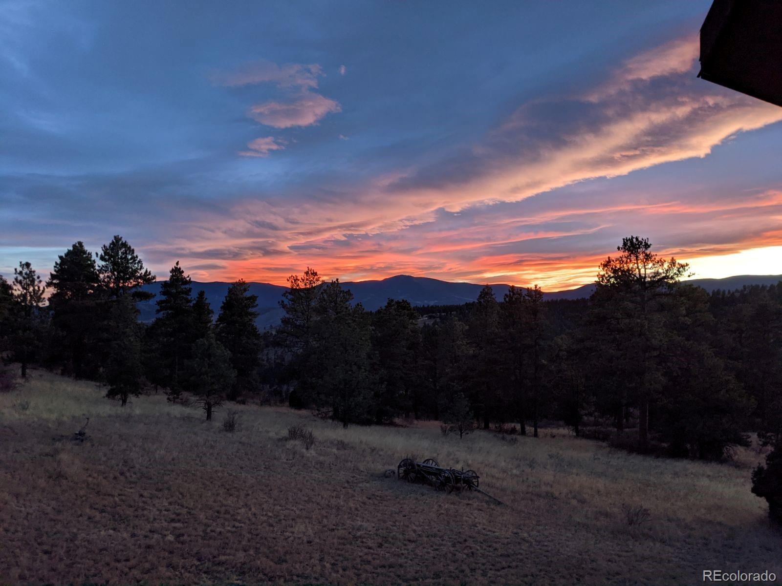 14482 Jubilee Trail Pine, CO 80470 - Photo 40 of 40 a view of sunset