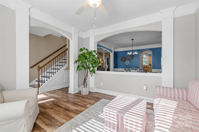 a view of a bedroom with furniture and staircase