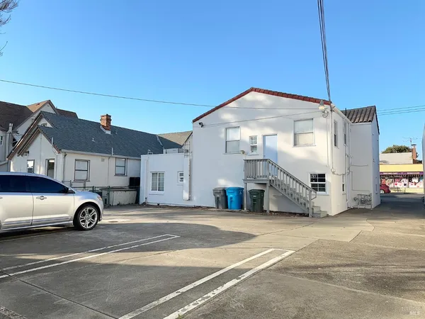 a car parked in front of a house