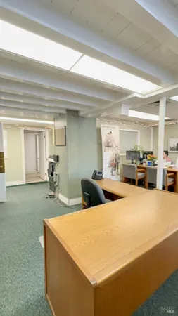 a very nice looking room with kitchen island