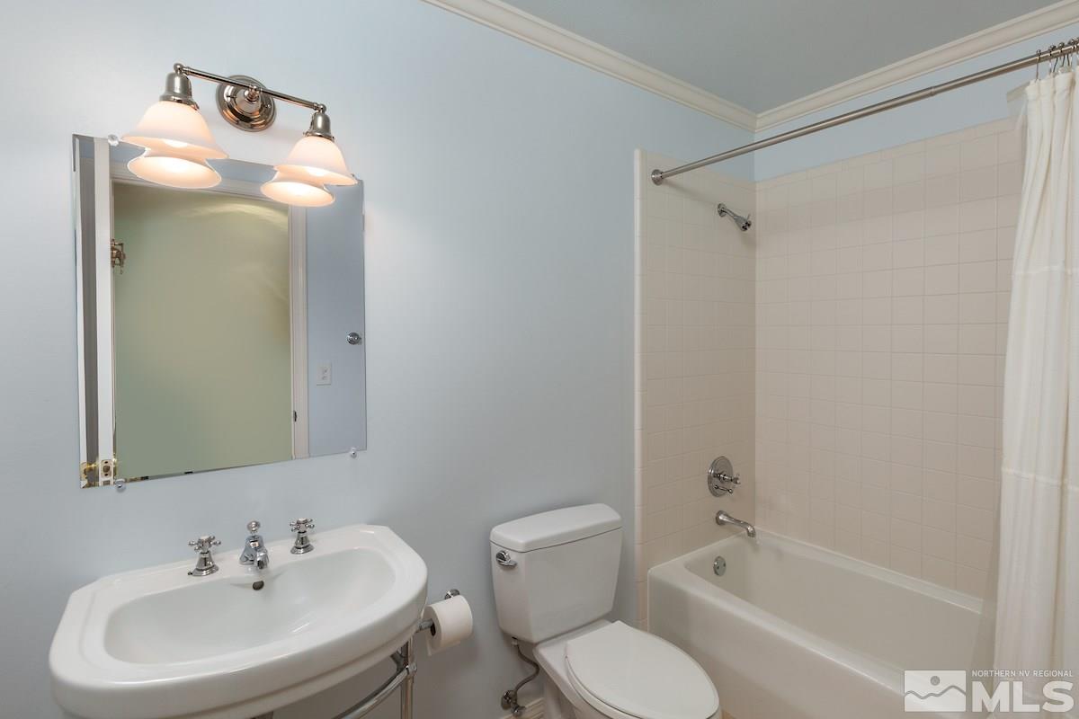2512 Lake Ridge Shores Circle Reno, NV 89519 - Photo 15 of 25 a bathroom with a sink toilet and shower