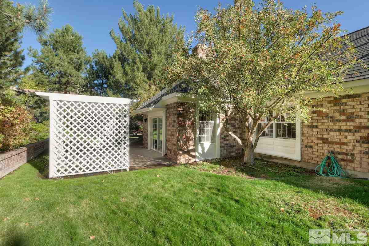 2512 Lake Ridge Shores Circle Reno, NV 89519 - Photo 20 of 25 a view of a backyard with a garden