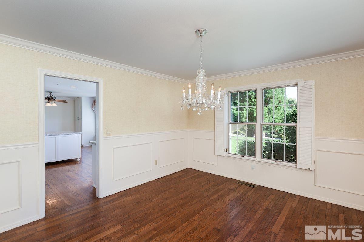 2512 Lake Ridge Shores Circle Reno, NV 89519 - Photo 6 of 25 a view of empty room with wooden floor and fan