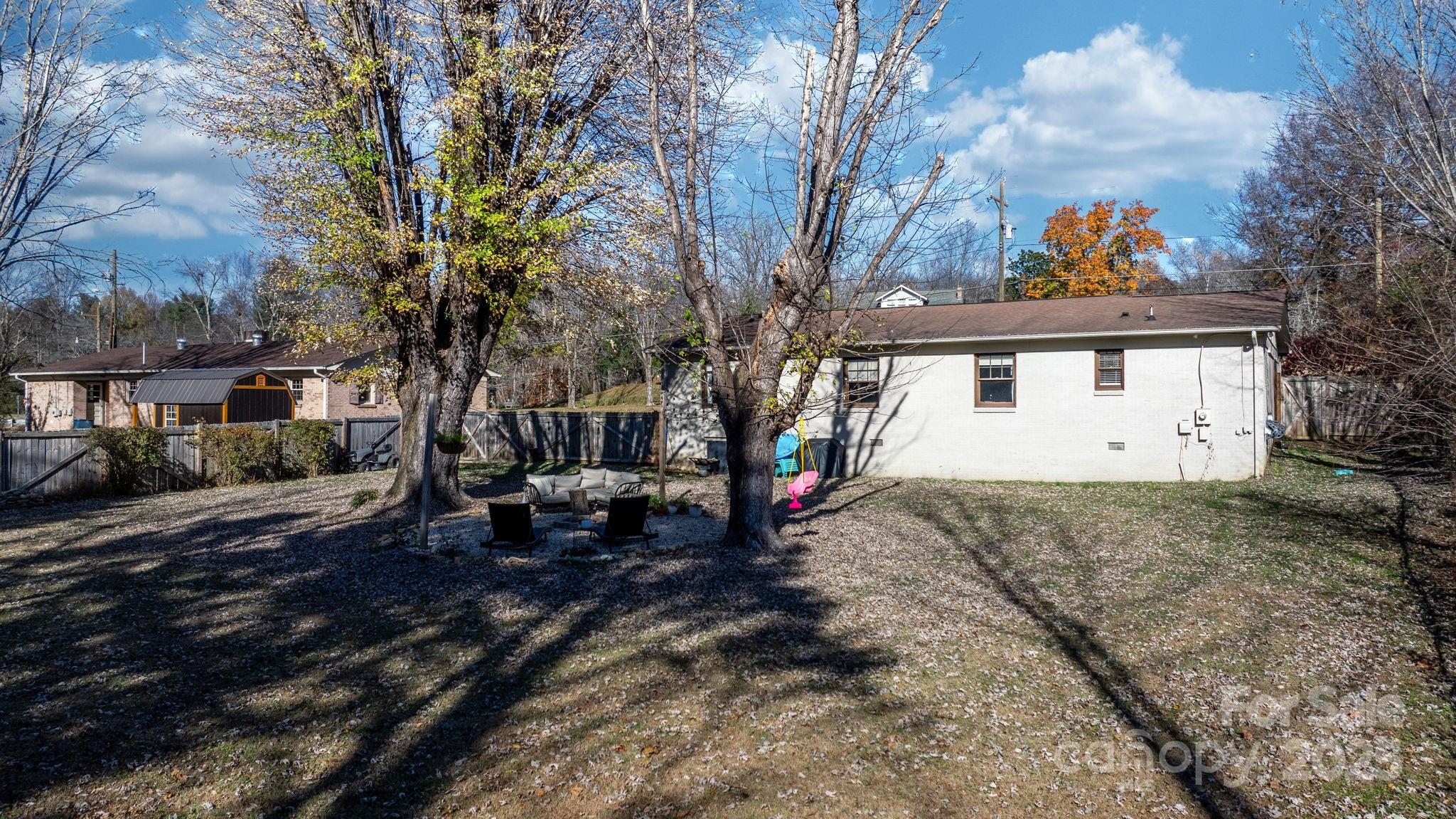 631 Powell Road Northeast Lenoir, NC 28645 - Photo 12 of 38 a front view of a house with a yard