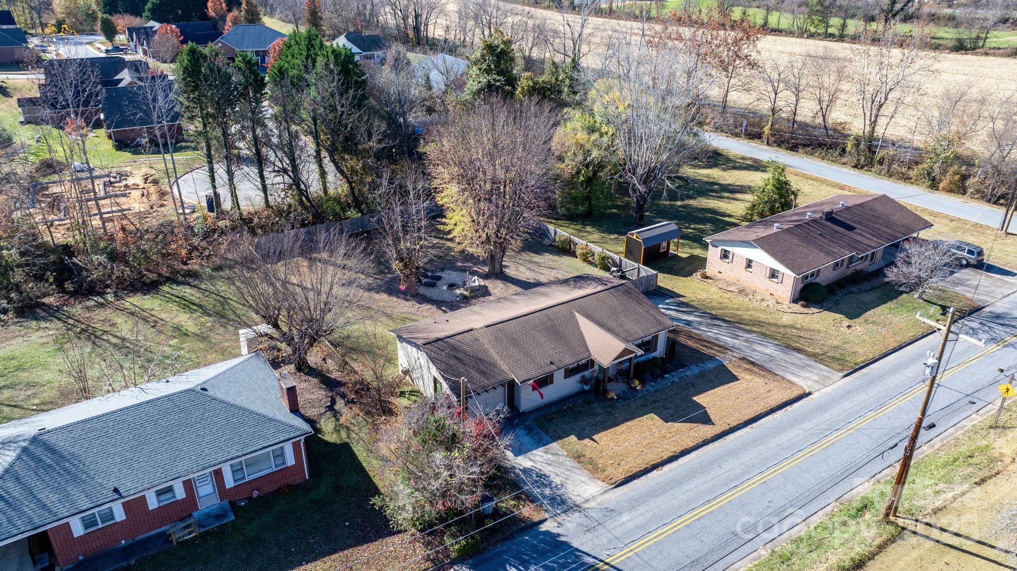631 Powell Road Northeast Lenoir, NC 28645 - Photo 16 of 38 an aerial view of a house with outdoor space