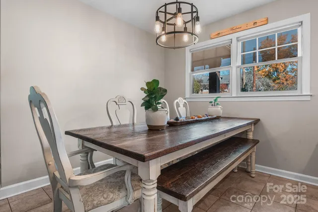 a kitchen with a sink cabinets and window
