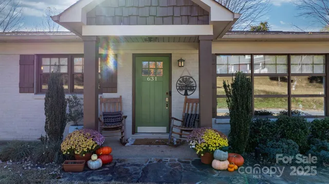 a room that has a bunch of flowers in it