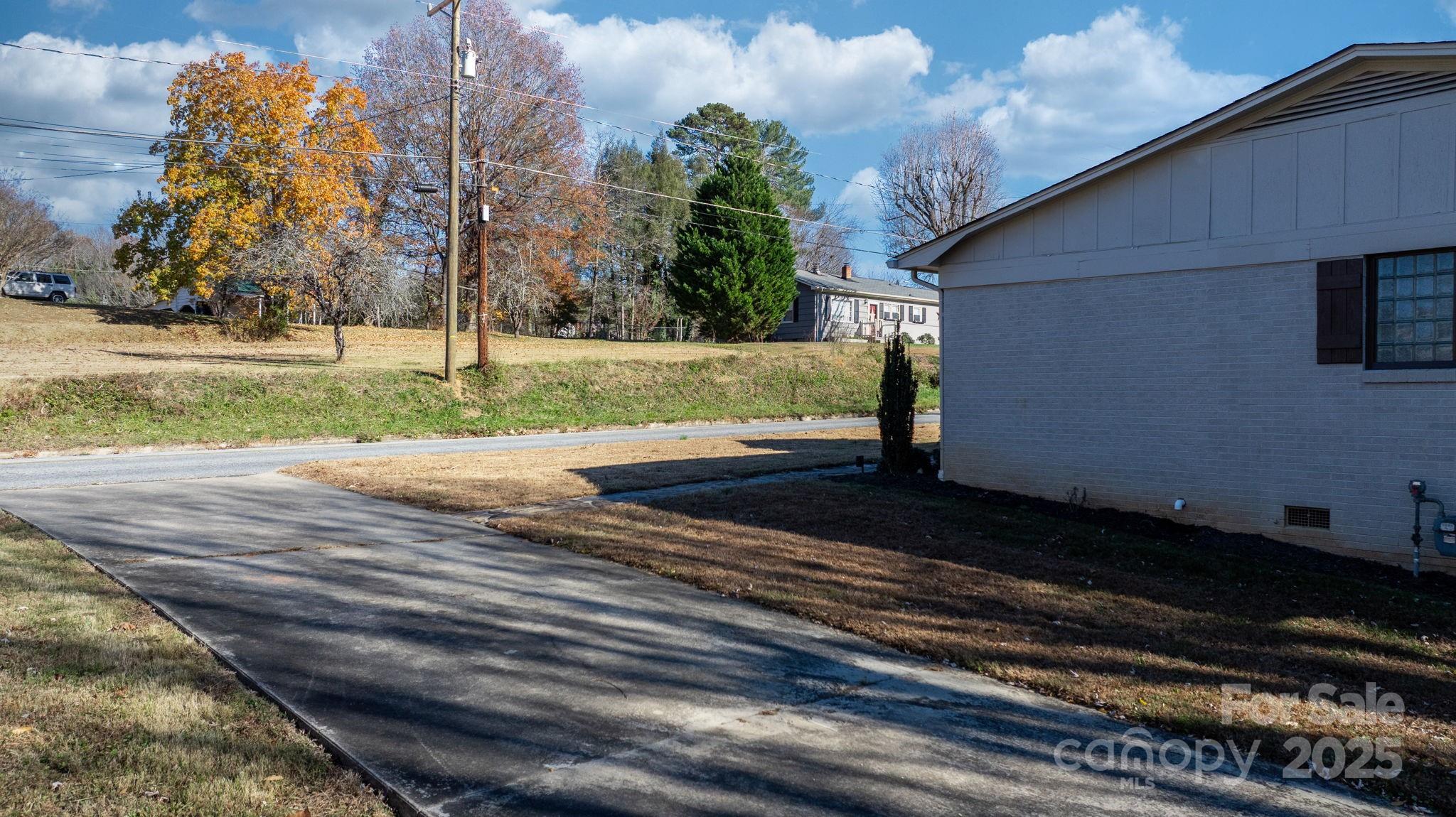 631 Powell Road Northeast Lenoir, NC 28645 - Photo 9 of 38 a view of a backyard of the house