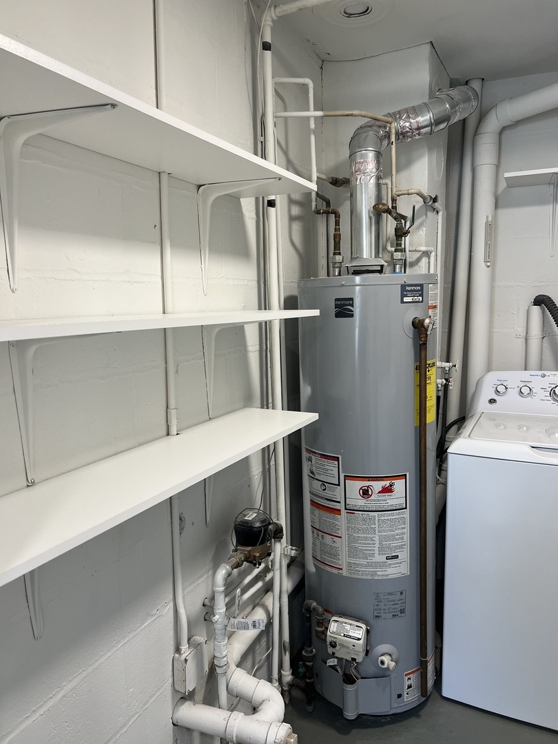 407 Abe Street Plano, IL 60545 - Photo 11 of 15 a view of storage and utility room