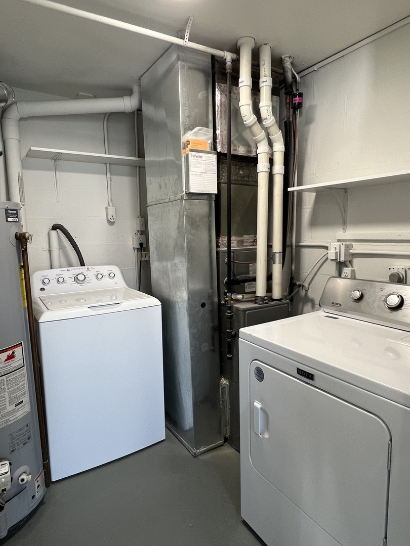 407 Abe Street Plano, IL 60545 - Photo 12 of 15 a utility room with dryer and washer
