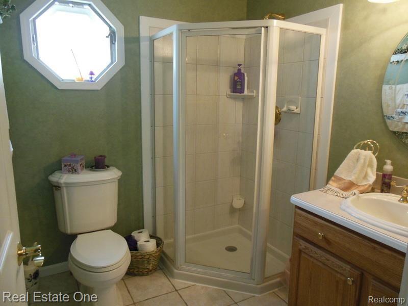 10155 Roberts Road Gregory, MI 48137 - Photo 29 of 89 1 st floor full bath with stand up shower all commodes Kohler.