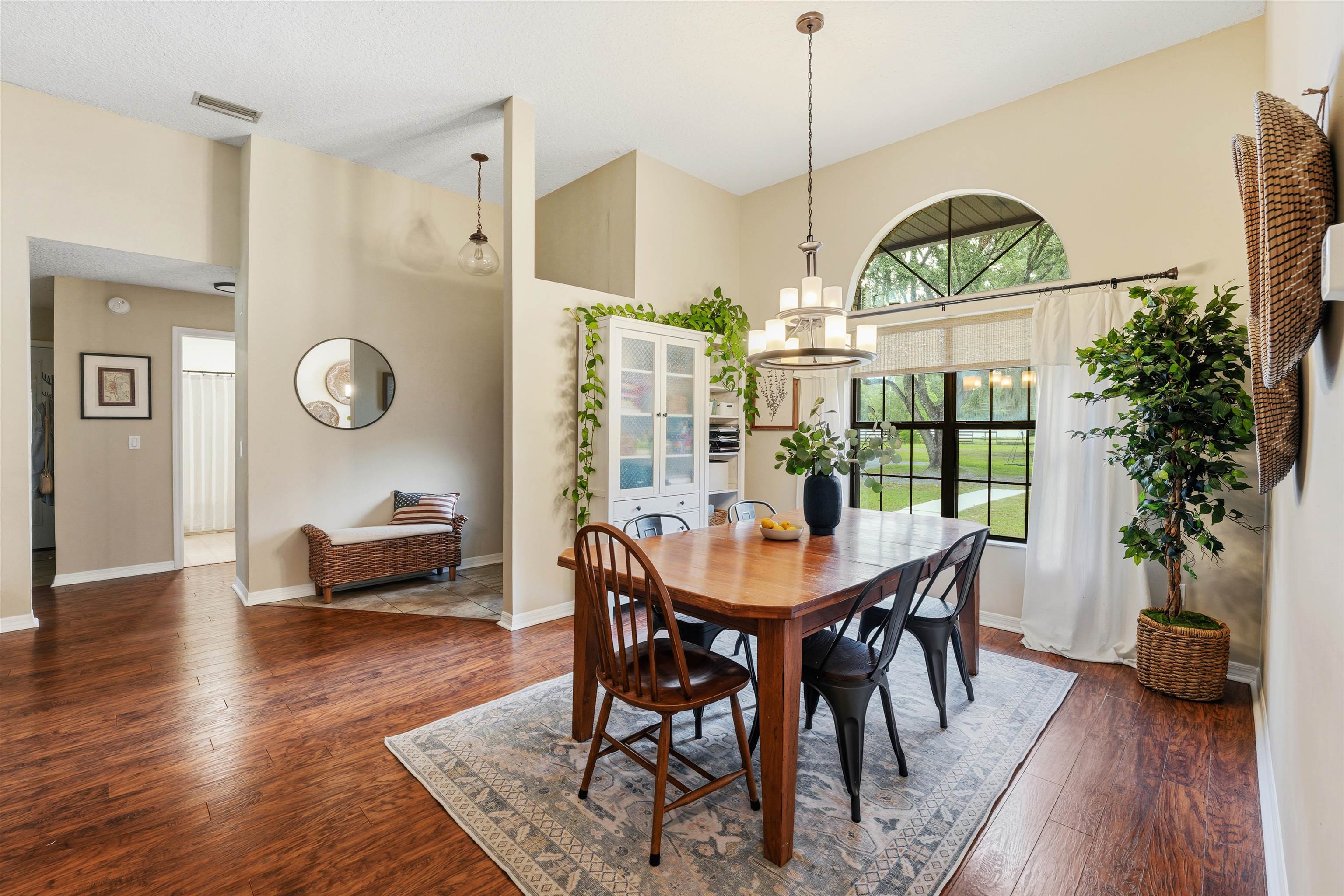 1805 Bennett Road St. Augustine, FL 32092 - Photo 18 of 65 a view of a dining room with furniture window and wooden floor
