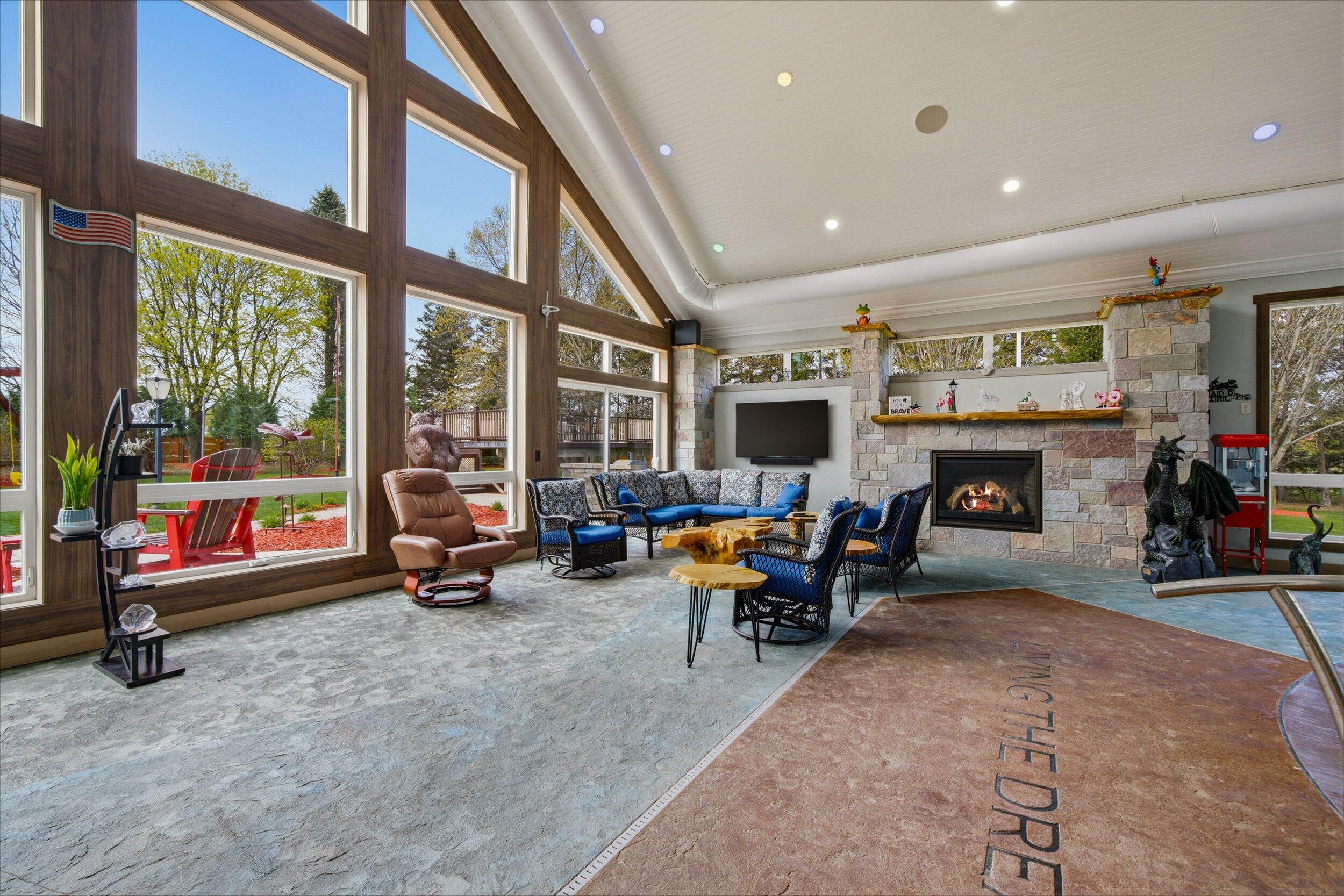 890 County Highway Kewaskum, WI 53040 - Photo 6 of 40 Gas fireplace and amazing views. All furniture & TV included
