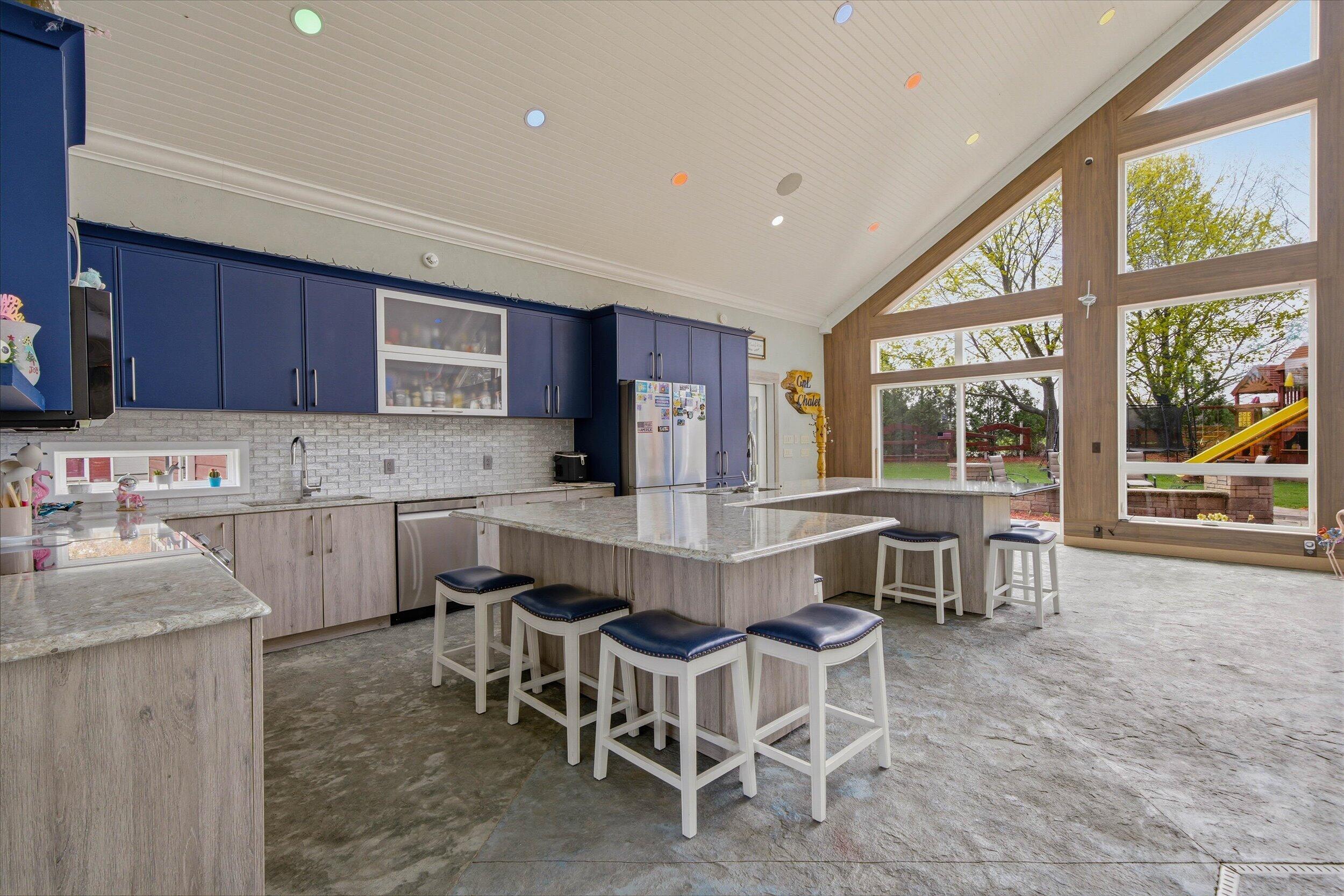 890 County Highway Kewaskum, WI 53040 - Photo 8 of 40 custom cabinets. Bar stools & appliances included