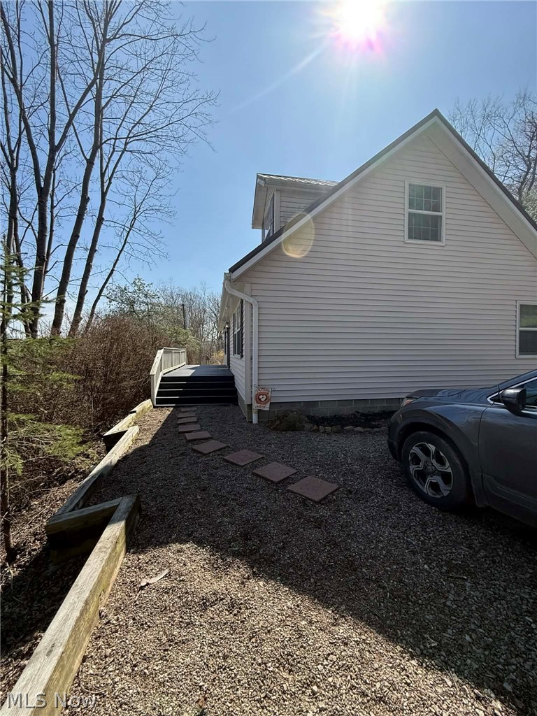 7170 Old Town Road Mount Perry, OH 43760 - Photo 4 of 41 View of property exterior featuring a deck