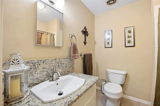 a bathroom with a sink and a toilet