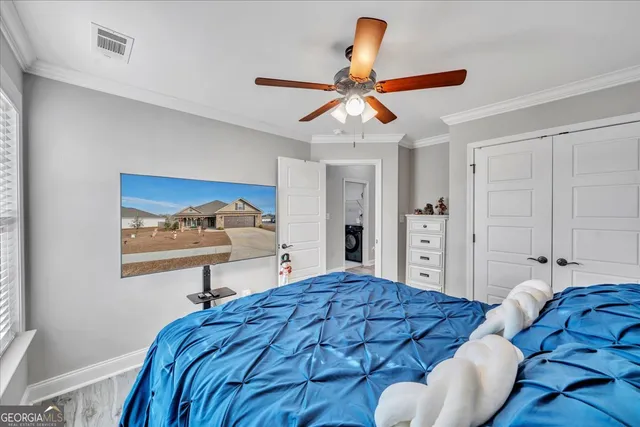 a view of a storage & utility room with wooden floor