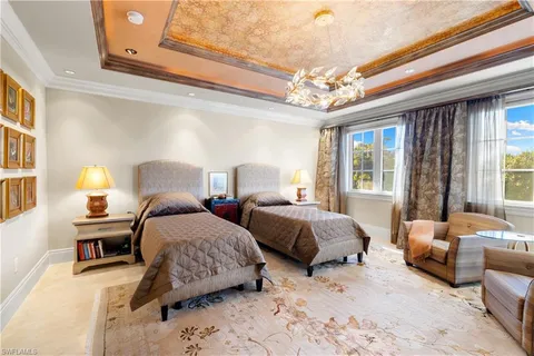 a view of a living room and kitchen