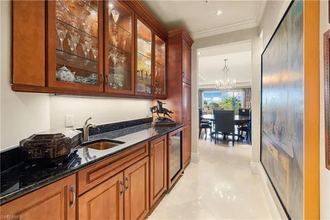 a bathroom with a sink vanity and a mirror