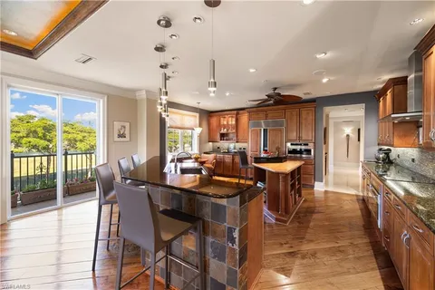 a vase of flowers sitting in front of a building