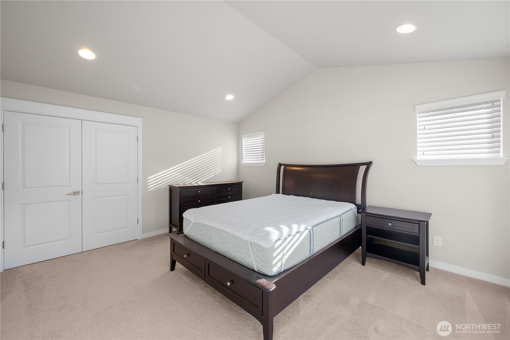 26925 230th Place Southeast Maple Valley, WA 98038 - Photo 12 of 32 a bed room with a bed and a lamp