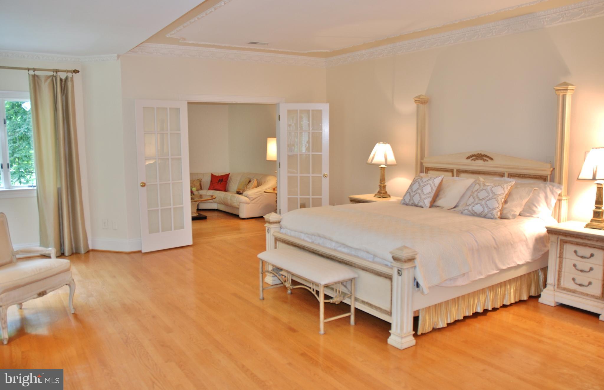 11548 Springridge Road Potomac, MD 20854 - Photo 18 of 30 a bedroom with a bed and a view of bedroom