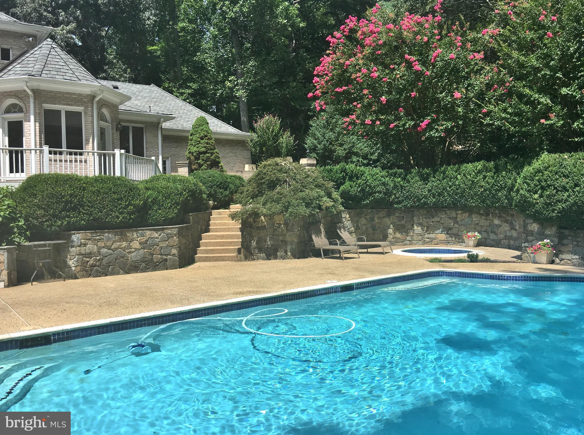 11548 Springridge Road Potomac, MD 20854 - Photo 28 of 30 a view of a house with pool and a yard