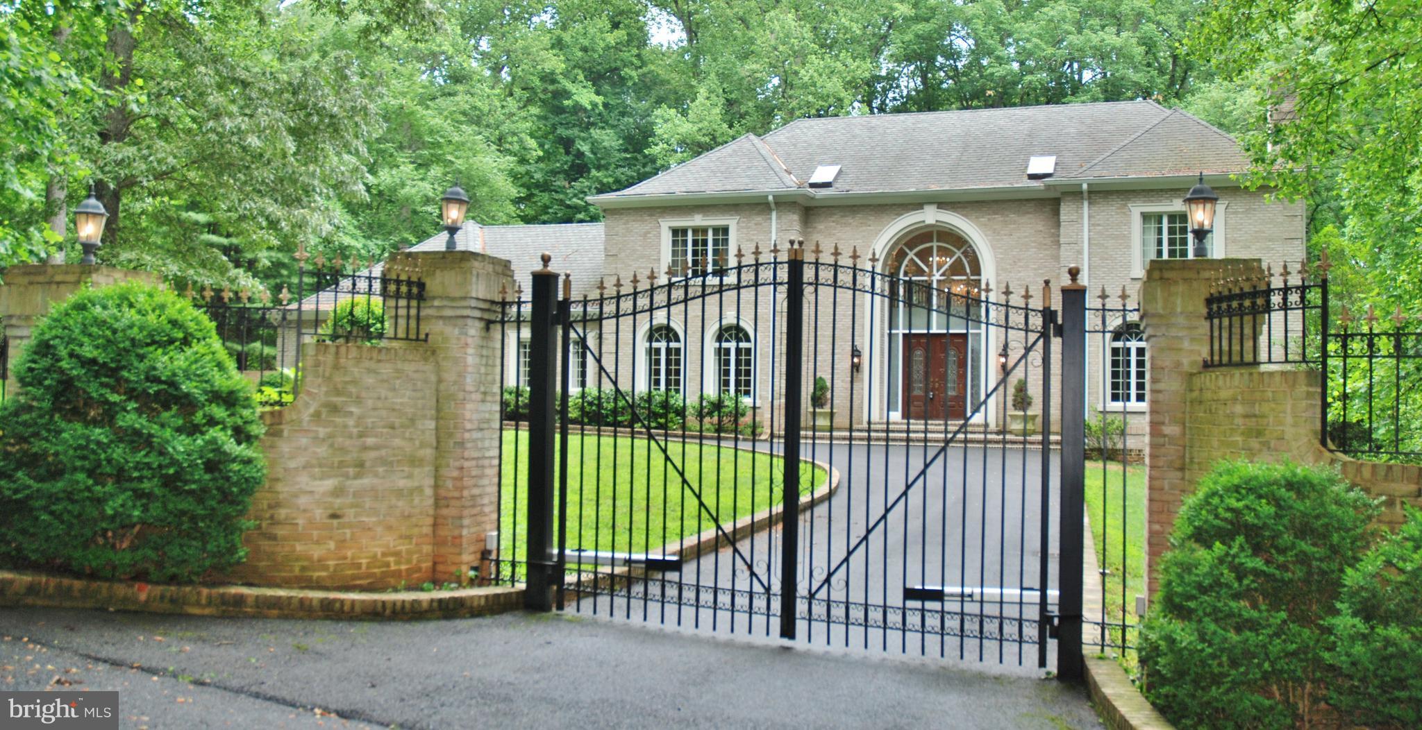 11548 Springridge Road Potomac, MD 20854 - Photo 4 of 30 a view of a house with iron fence