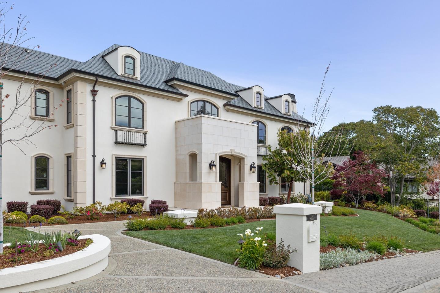 138 Stonepine Road Hillsborough, CA 94010 - Photo 117 of 119 a front view of a house with a garden and plants