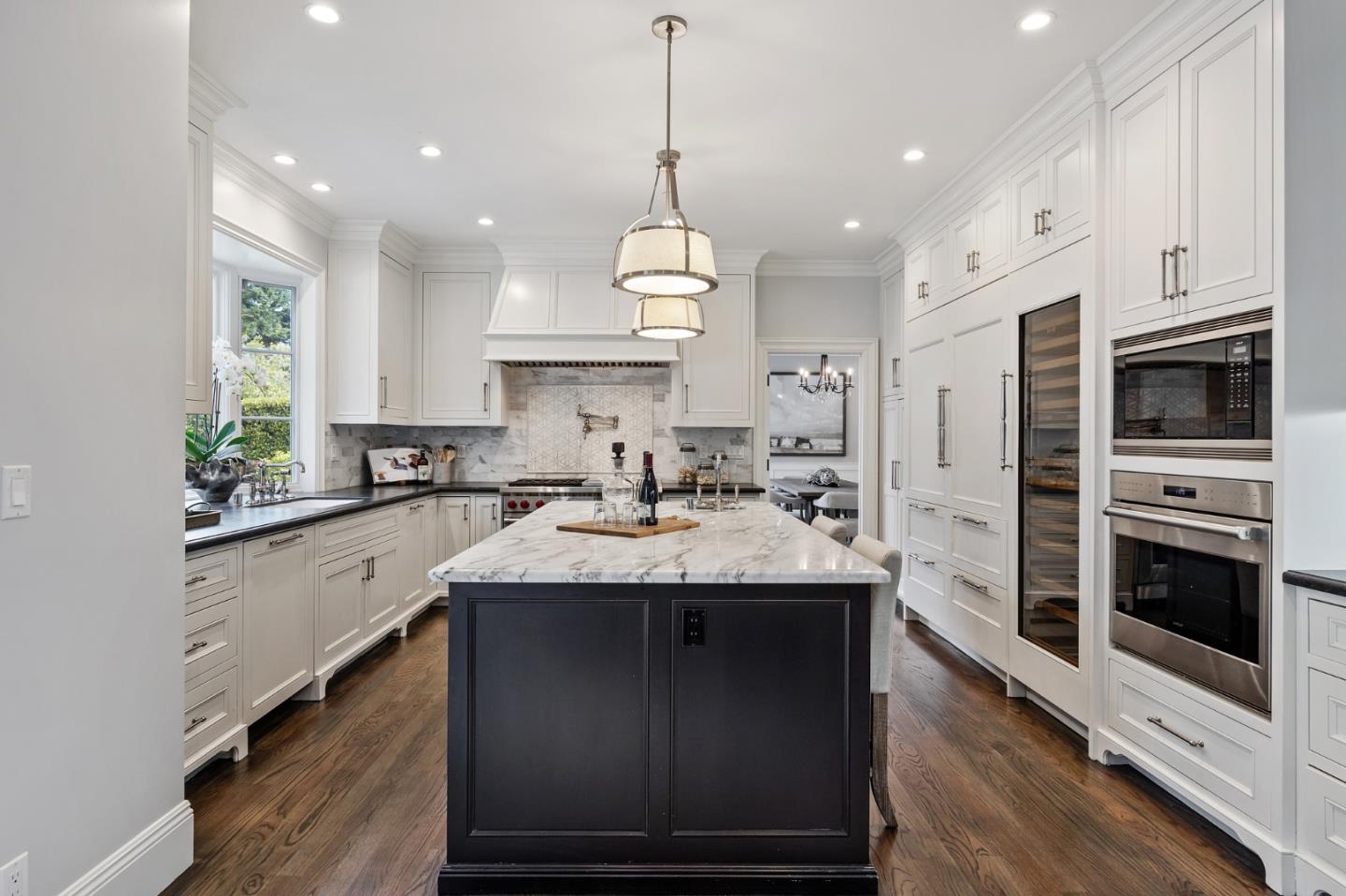 138 Stonepine Road Hillsborough, CA 94010 - Photo 16 of 119 a kitchen with stainless steel appliances granite countertop a sink a stove and a refrigerator