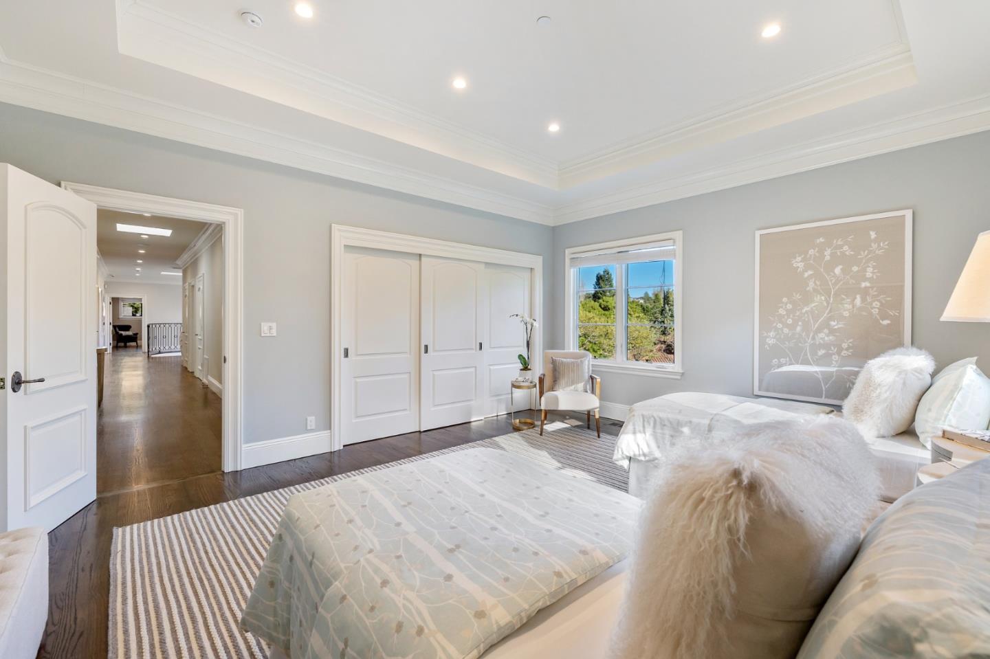 138 Stonepine Road Hillsborough, CA 94010 - Photo 61 of 119 a bedroom with a bed and wooden floor