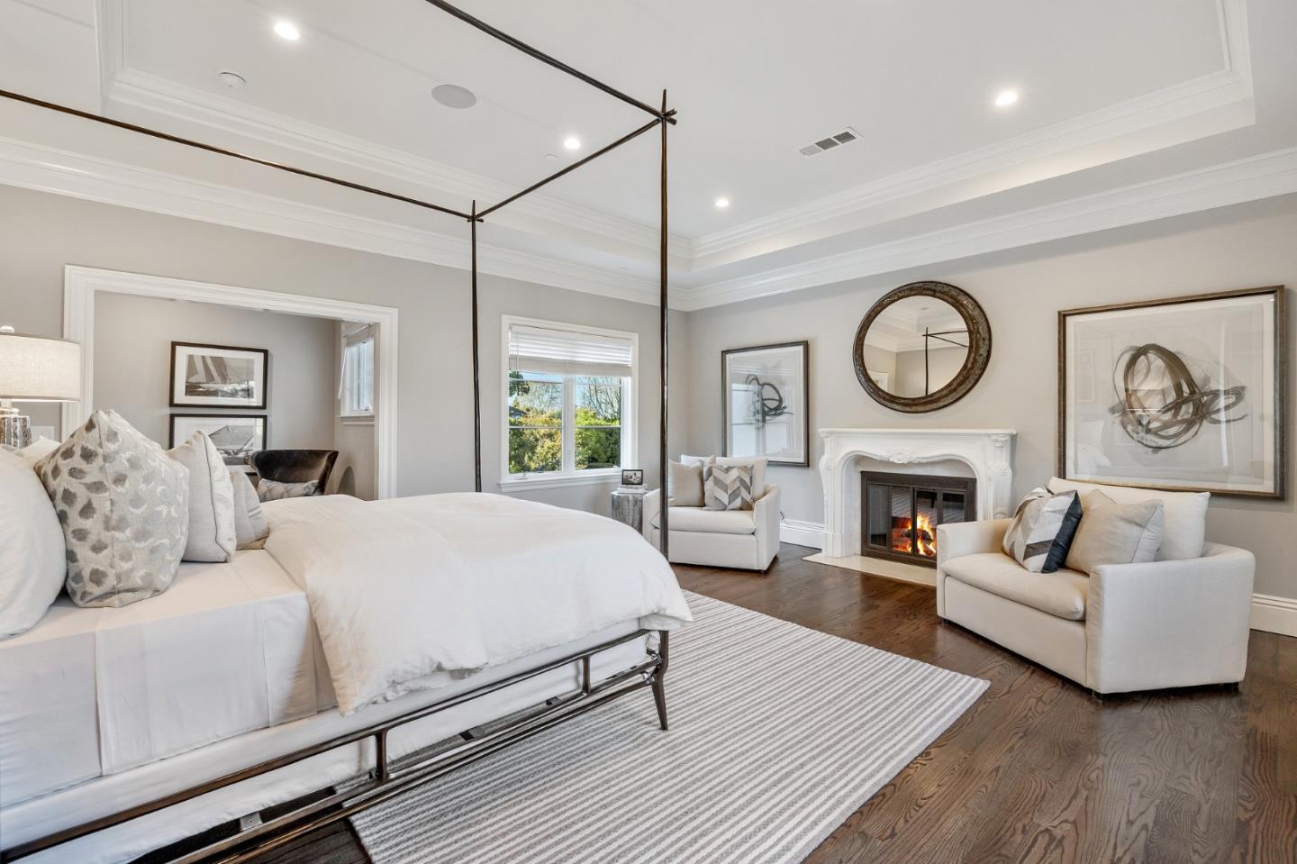 138 Stonepine Road Hillsborough, CA 94010 - Photo 76 of 119 a bedroom with a bed a couch and a fireplace