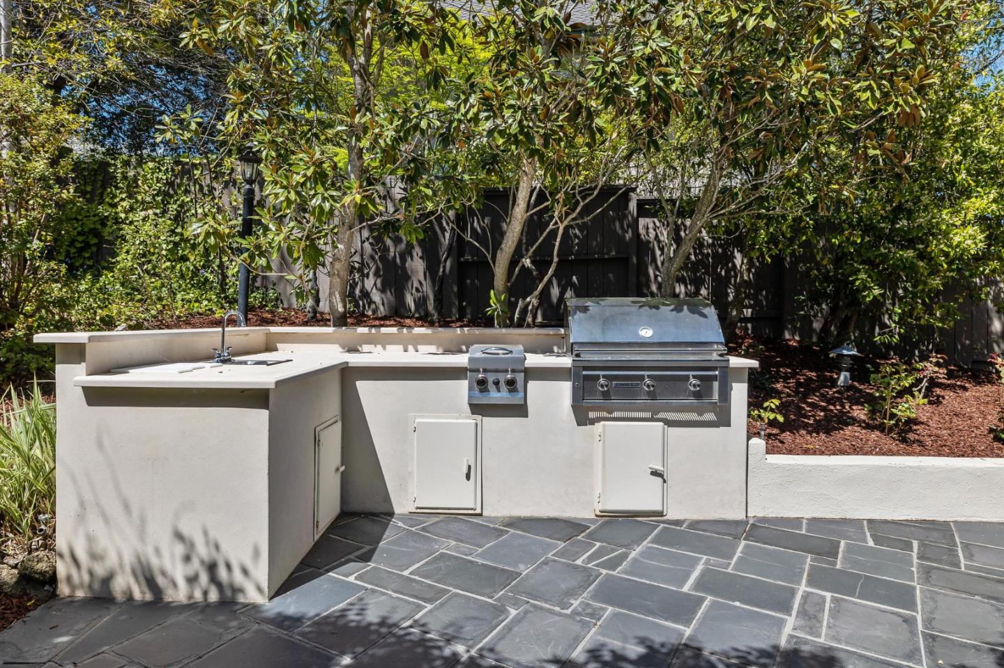 138 Stonepine Road Hillsborough, CA 94010 - Photo 91 of 119 a utility room with a stove a washer and dryer