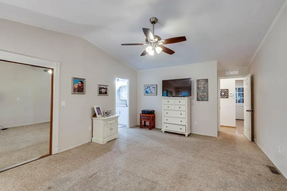9036 Lemon Avenue La Mesa, CA 91941 - Photo 20 of 28 a view of a livingroom with furniture and a flat screen tv