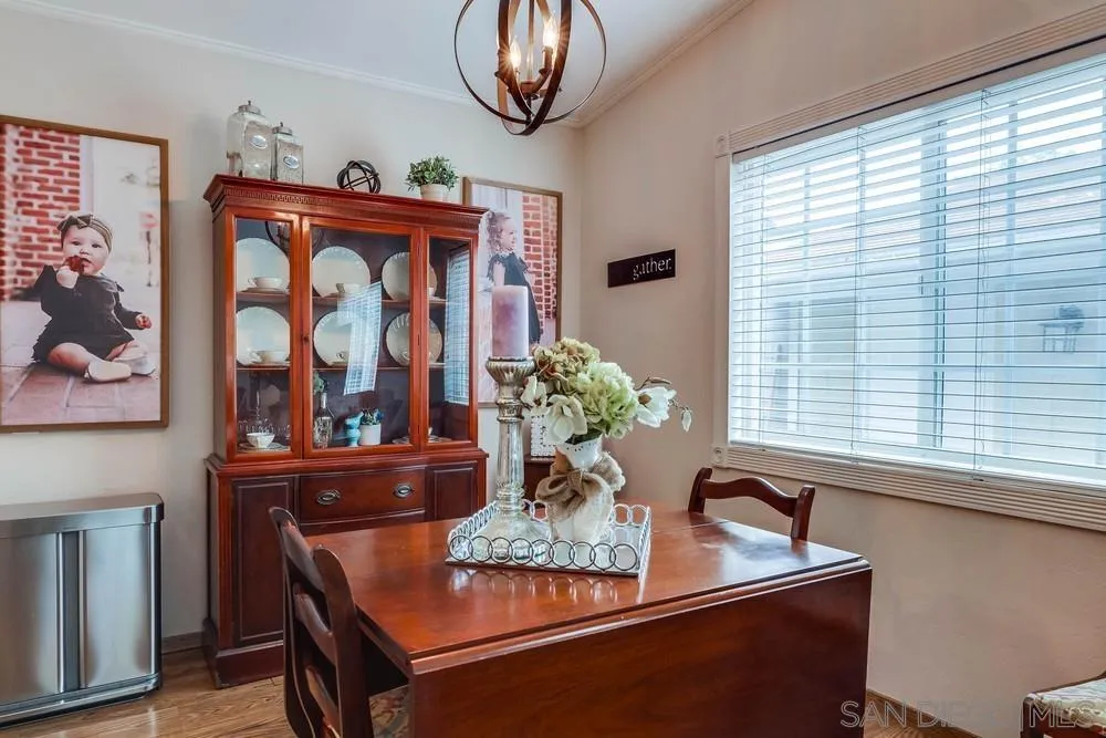 9036 Lemon Avenue La Mesa, CA 91941 - Photo 10 of 28 a view of a dining room with furniture window and wooden floor