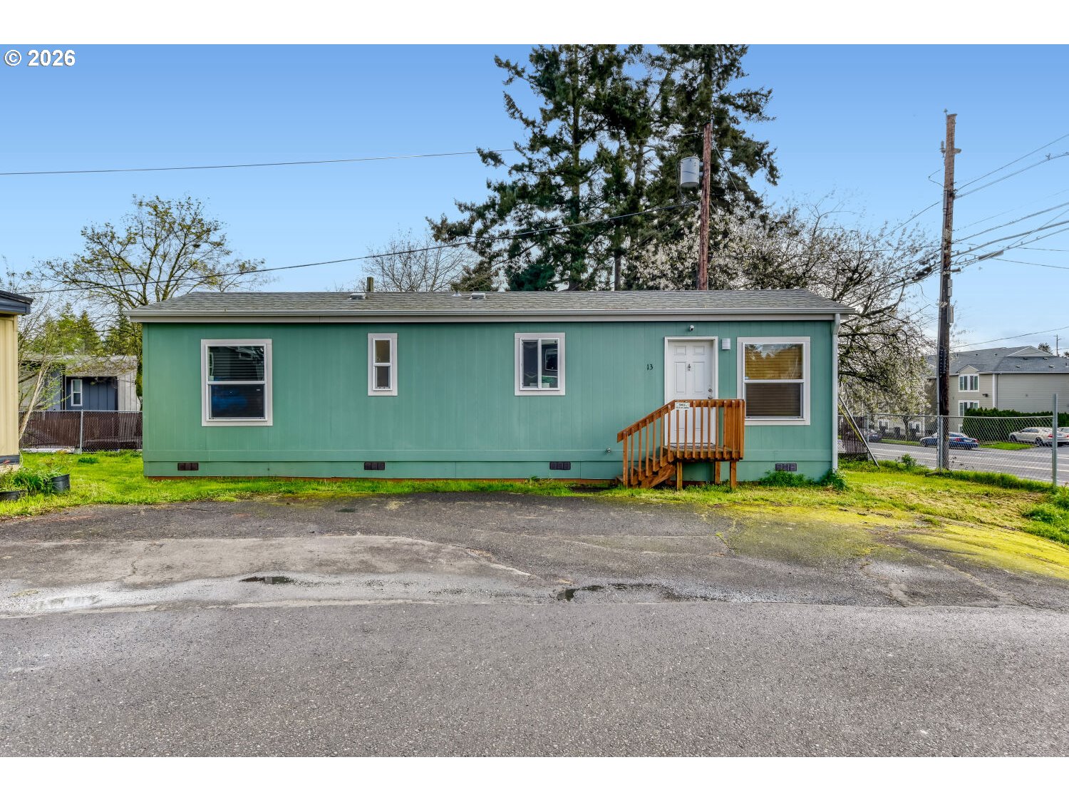 4264 Southeast 122nd Avenue, Unit 13 Portland, OR 97236 - Photo 1 of 30 a house view with a backyard space