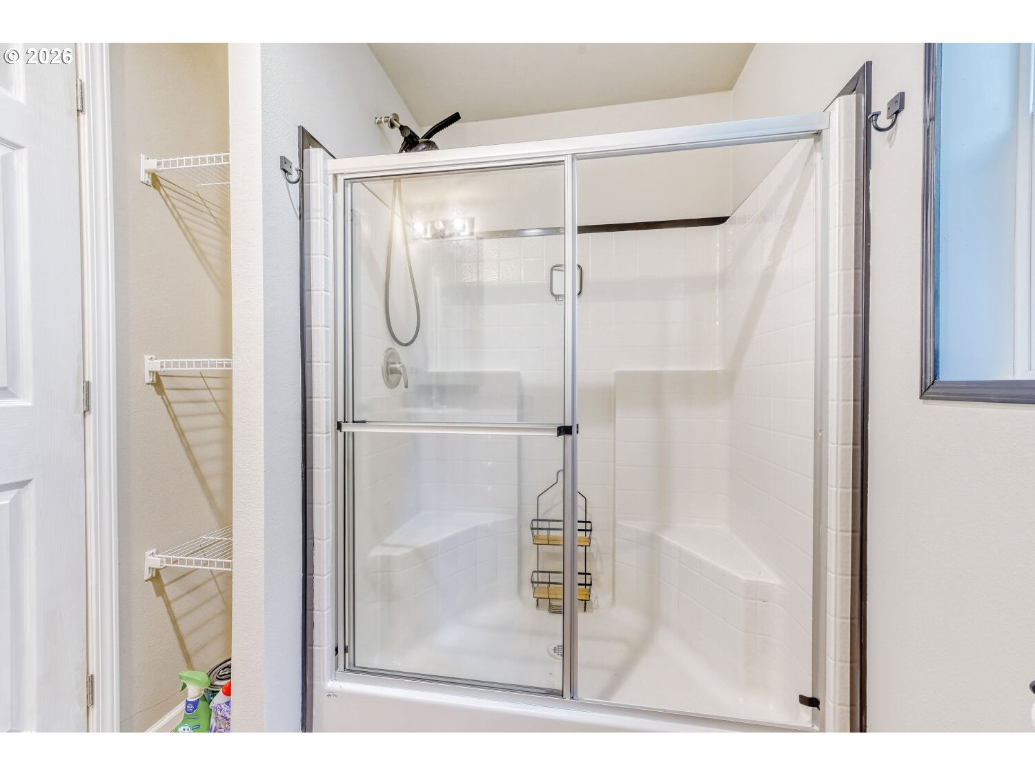 4264 Southeast 122nd Avenue, Unit 13 Portland, OR 97236 - Photo 20 of 30 a bathroom with a glass shower door