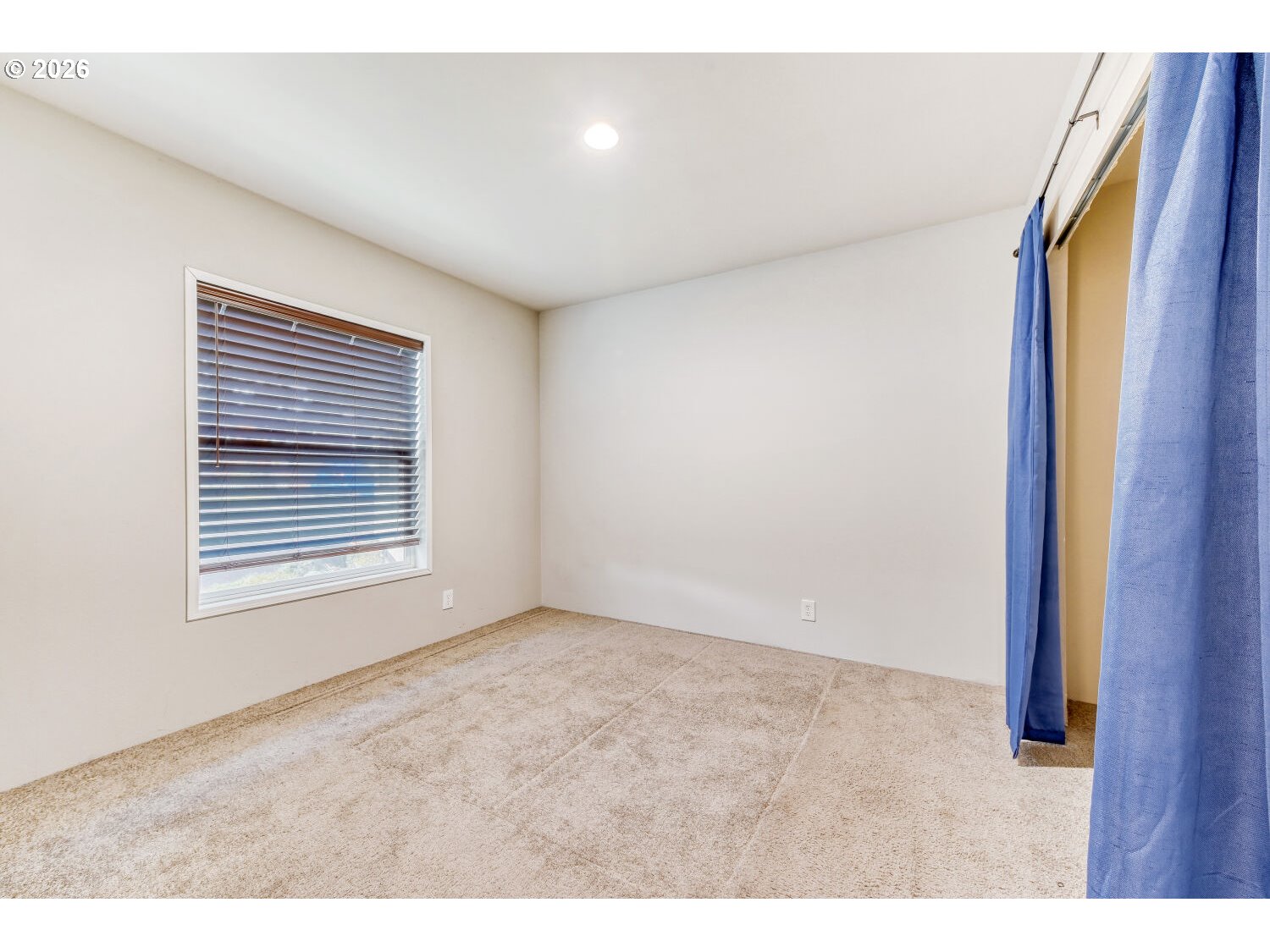 4264 Southeast 122nd Avenue, Unit 13 Portland, OR 97236 - Photo 22 of 30 a view of an empty room with a window