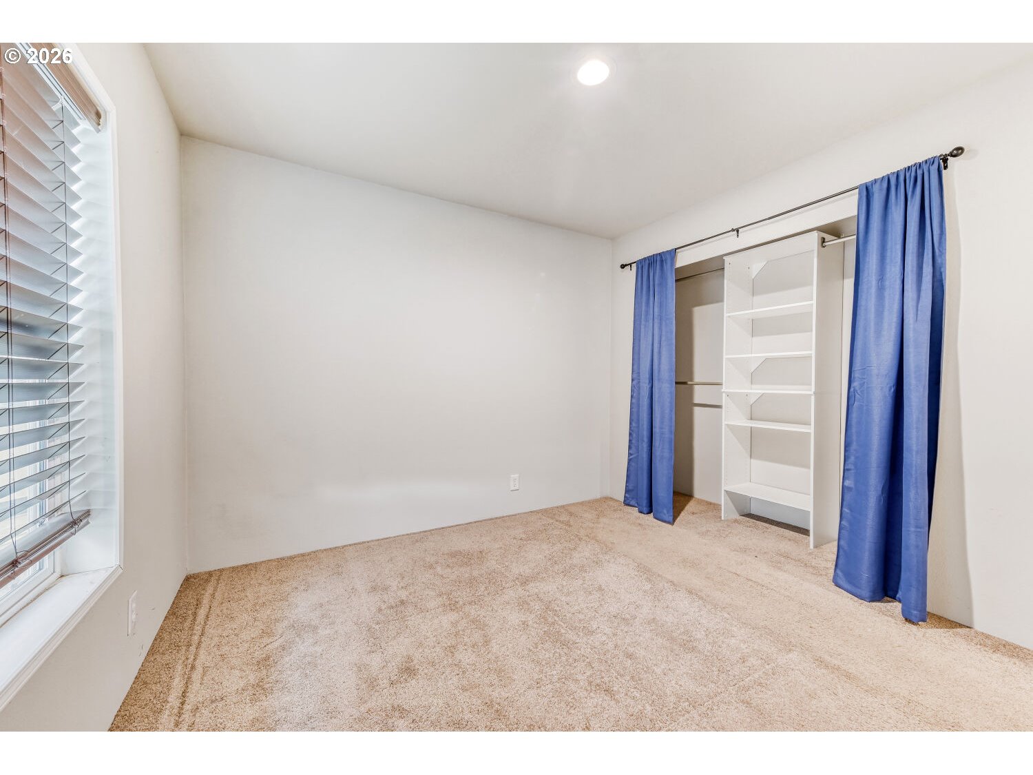 4264 Southeast 122nd Avenue, Unit 13 Portland, OR 97236 - Photo 24 of 30 a view of an empty room and closet area
