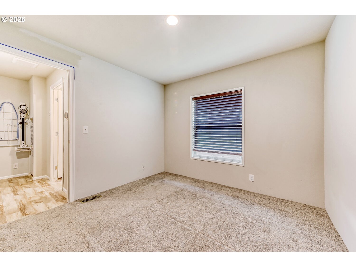 4264 Southeast 122nd Avenue, Unit 13 Portland, OR 97236 - Photo 25 of 30 a view of an empty room with a window